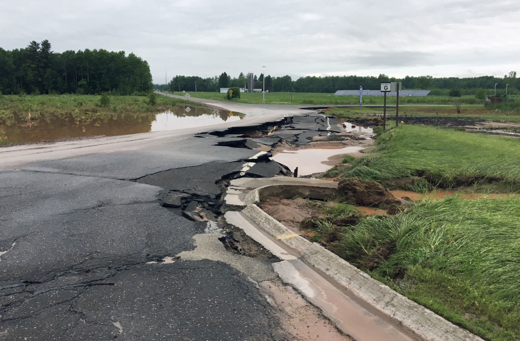 Ashland County Highway G flooding damage, AP photo